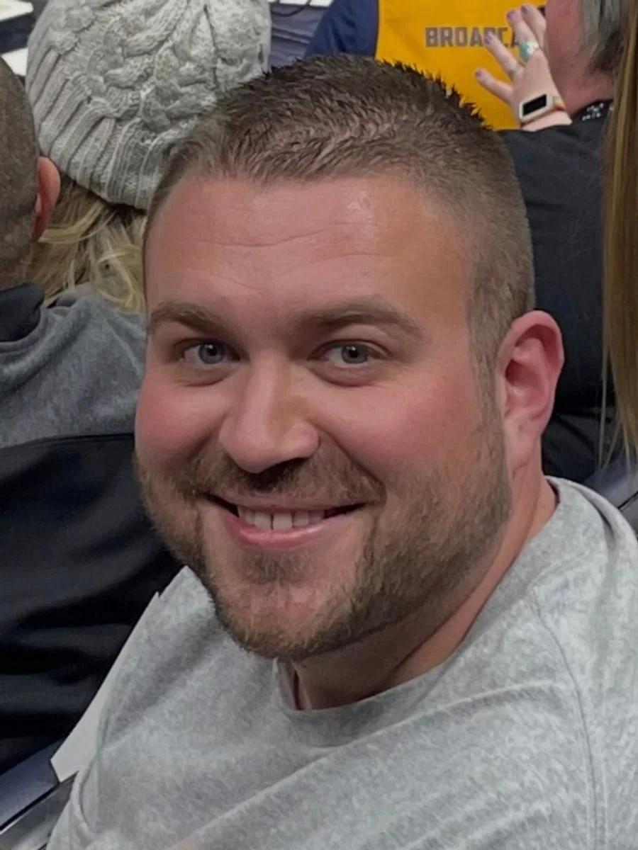 Laird Doman before, at a basketball game